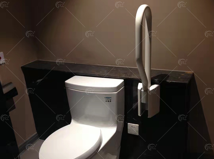 Flip up the armrest